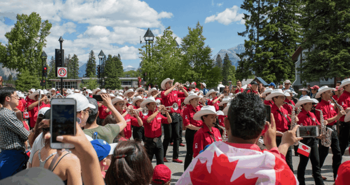 A diverse crowd celebrates Canada Day in Calgary, Alberta, highlighting the importance of community, belonging, and connection.